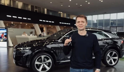 Олимпиада чемпионы Михаилдың әкесіне Audi Q8 автокөлігі сыйға берілді