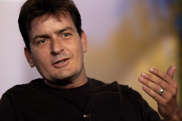 Charlie Sheen discusses his new comedy series 'Two And A Half Men' with television critics during the CBS television network presentation at the Television Critics Association Summer press tour in Hollywood, July 21, 2003. REUTERS/Lucy Nicholson REUTERS LN