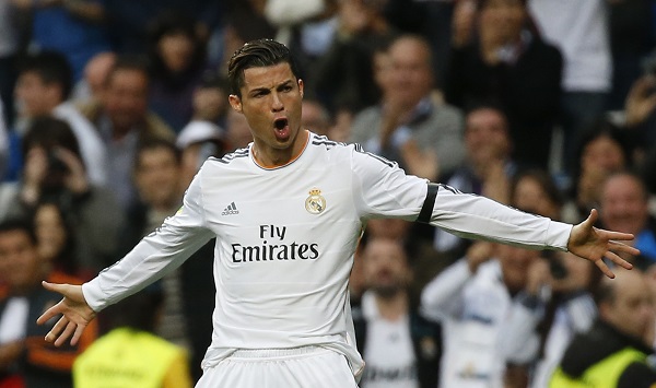Real Madrid's Cristiano Ronaldo celebrates his goal against Osasuna during their Spanish First Division soccer match at Santiago Bernabeu stadium in Madrid April 26, 2014. REUTERS/Andrea Comas (SPAIN - Tags: SPORT SOCCER)