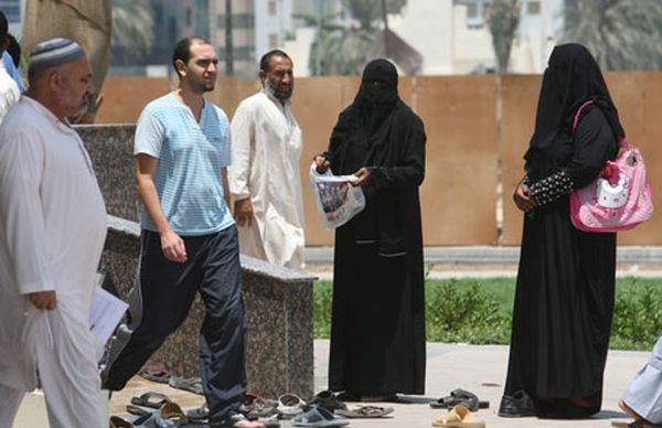 Beggars beg for money during ramadan near a mosque in Sharjah, August 5,2011.  Photo by Mustafa Kasmi