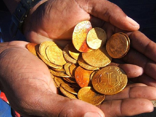 Dozens of gold Spanish coins were among the treasure trove. Picture: Dieter NoliSource:Supplied