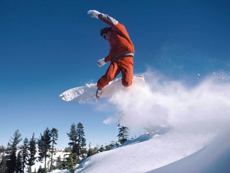 The Adobe Image Library ©1998 Adobe Systems Incorporated Snowboarder in mid-air