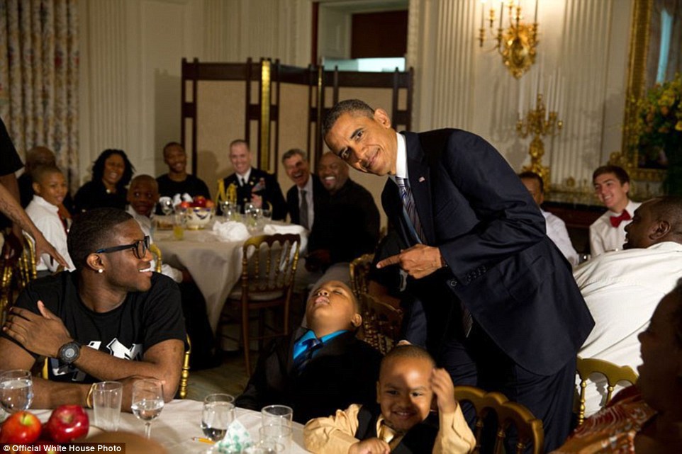 3A3F91B400000578-3926100-June_14_2013_Obama_with_a_young_boy_who_had_fallen_asleep_during-a-11_1478871703565