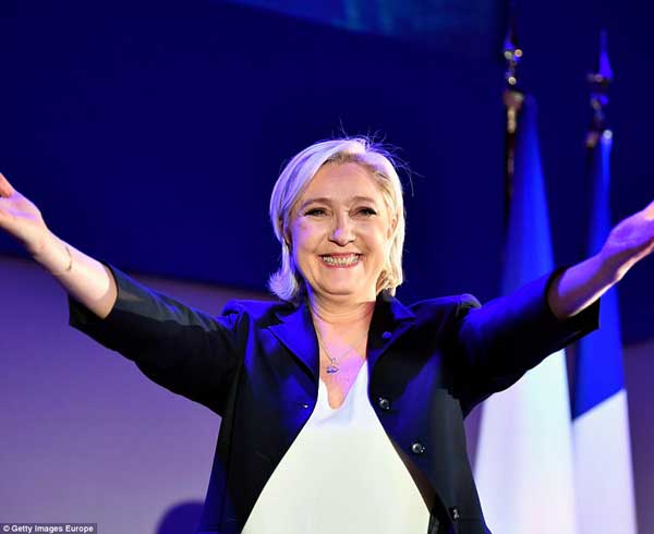 3F89EE2600000578-4437156-Le_Pen_went_to_greet_her_supporters_after_the_initial_results_an-a-93_1492991105576