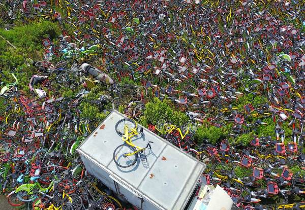 Жалға берілетін велосипедтер Қытай қалаларын басып қалды (фото)